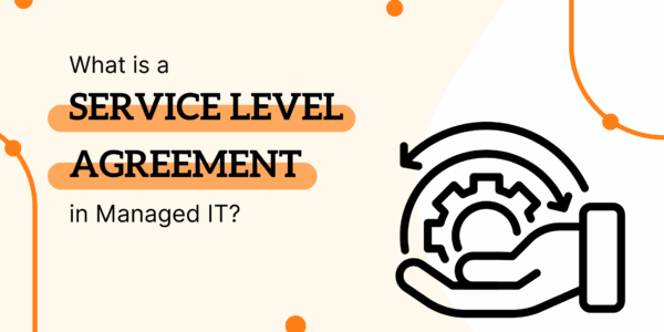 IT Manager Reviewing A Service-level Agreement (SLA) To Ensure Managed IT Support And Uptime Commitments For A Mid-sized Business.