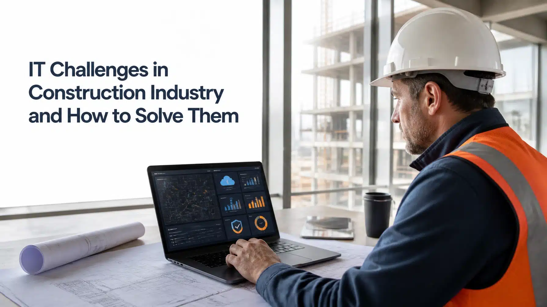 Construction project manager reviewing a secure jobsite technology dashboard to solve IT challenges in the construction industry.